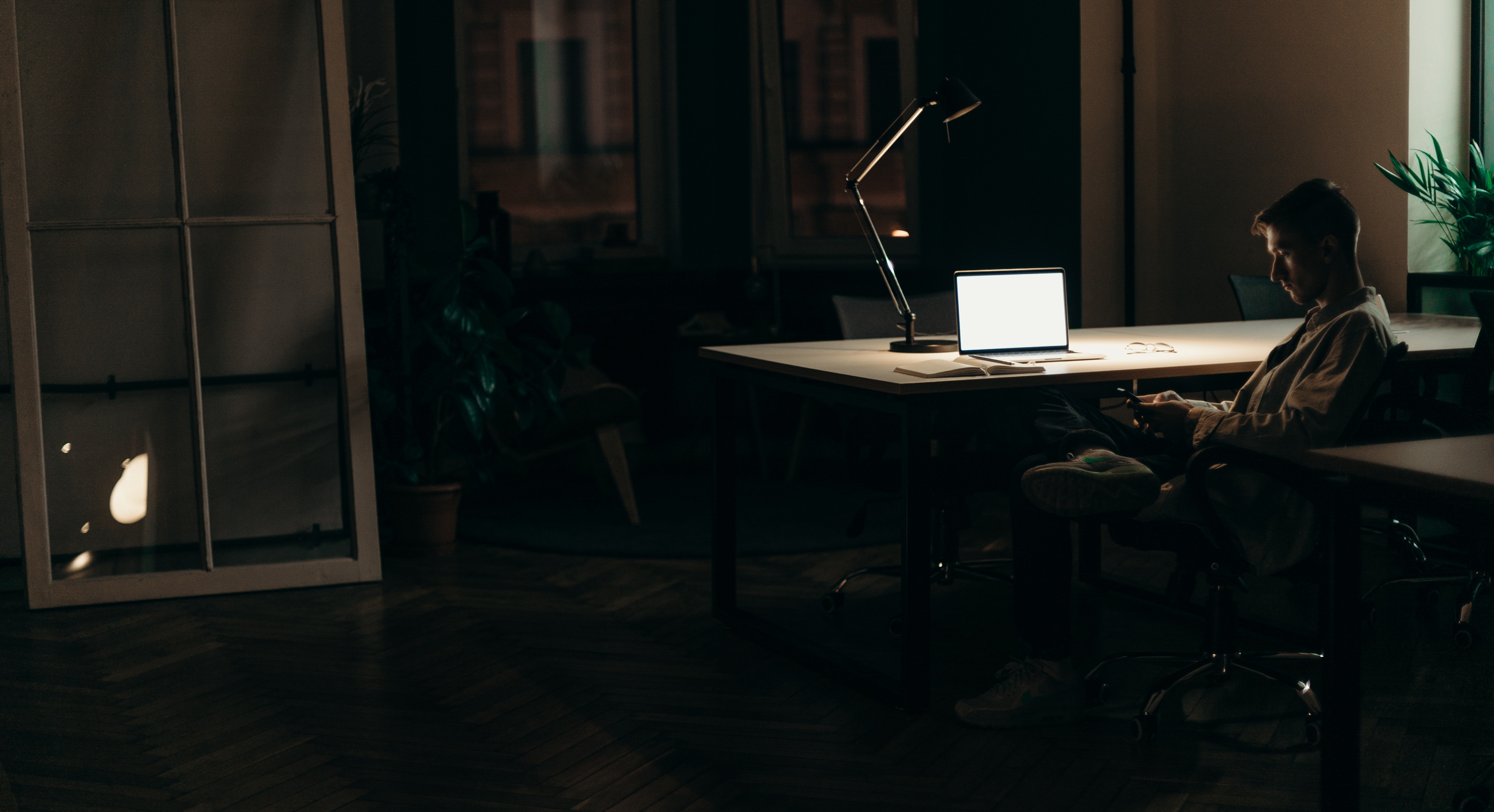 Man working alone at his office after hours